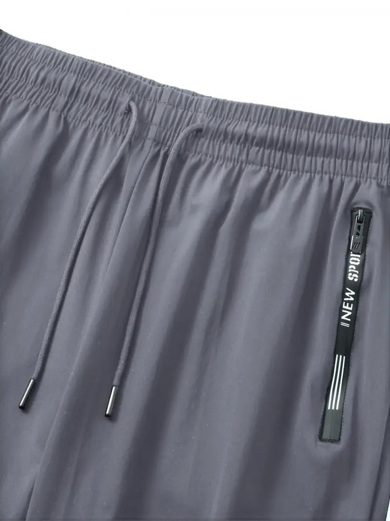 Unisex Quick-Dry Joggers with Elastic Waistband & Side Pockets - Breathable, Stretchy Casual Pants for Men and Women